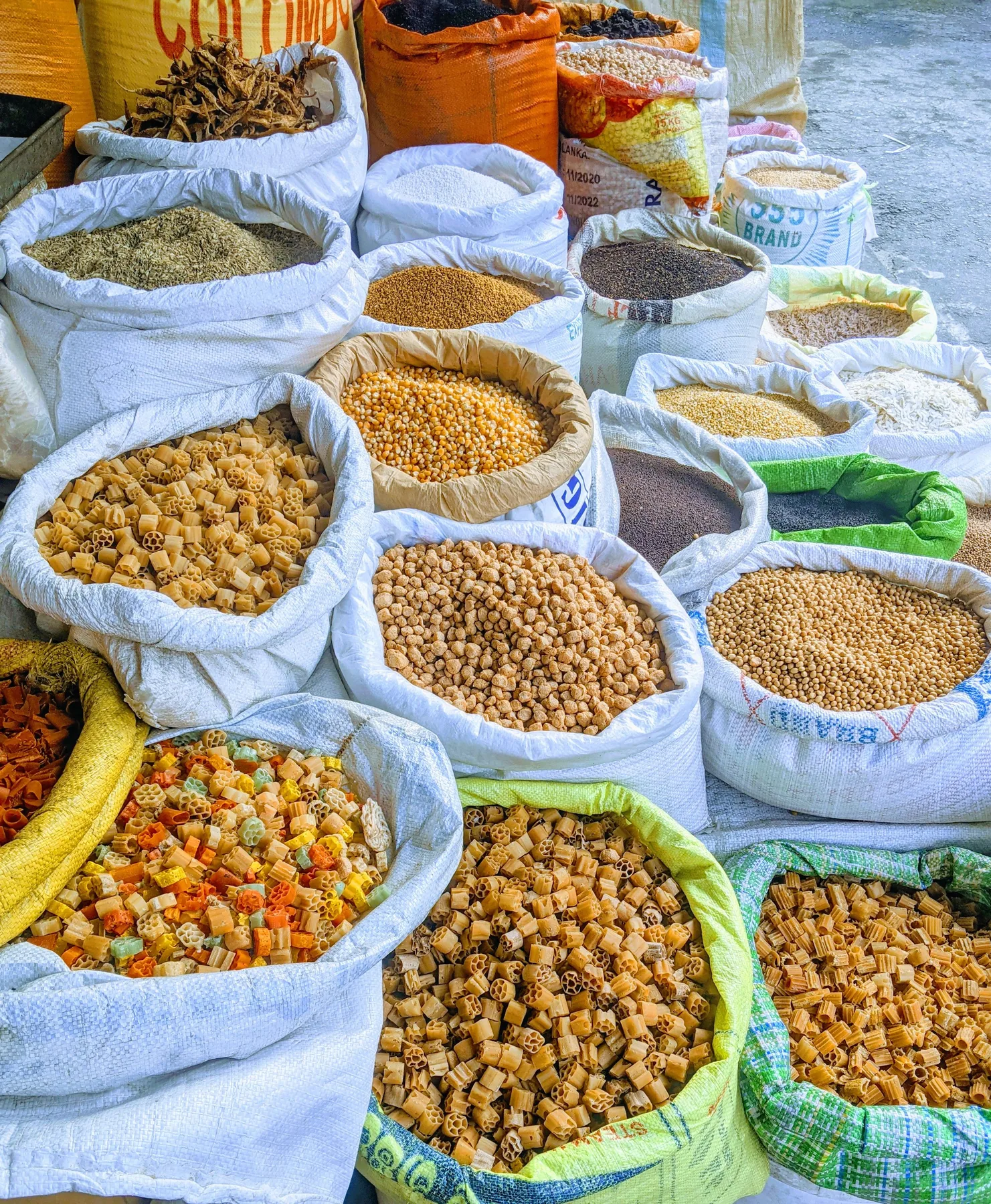 Open sacks containing assorted dry foods and grains
