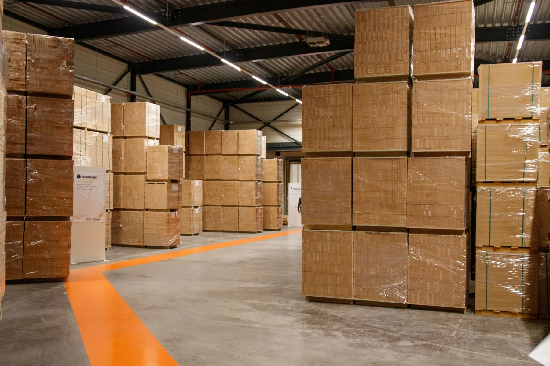 Warehouse with stacked packaged boxes